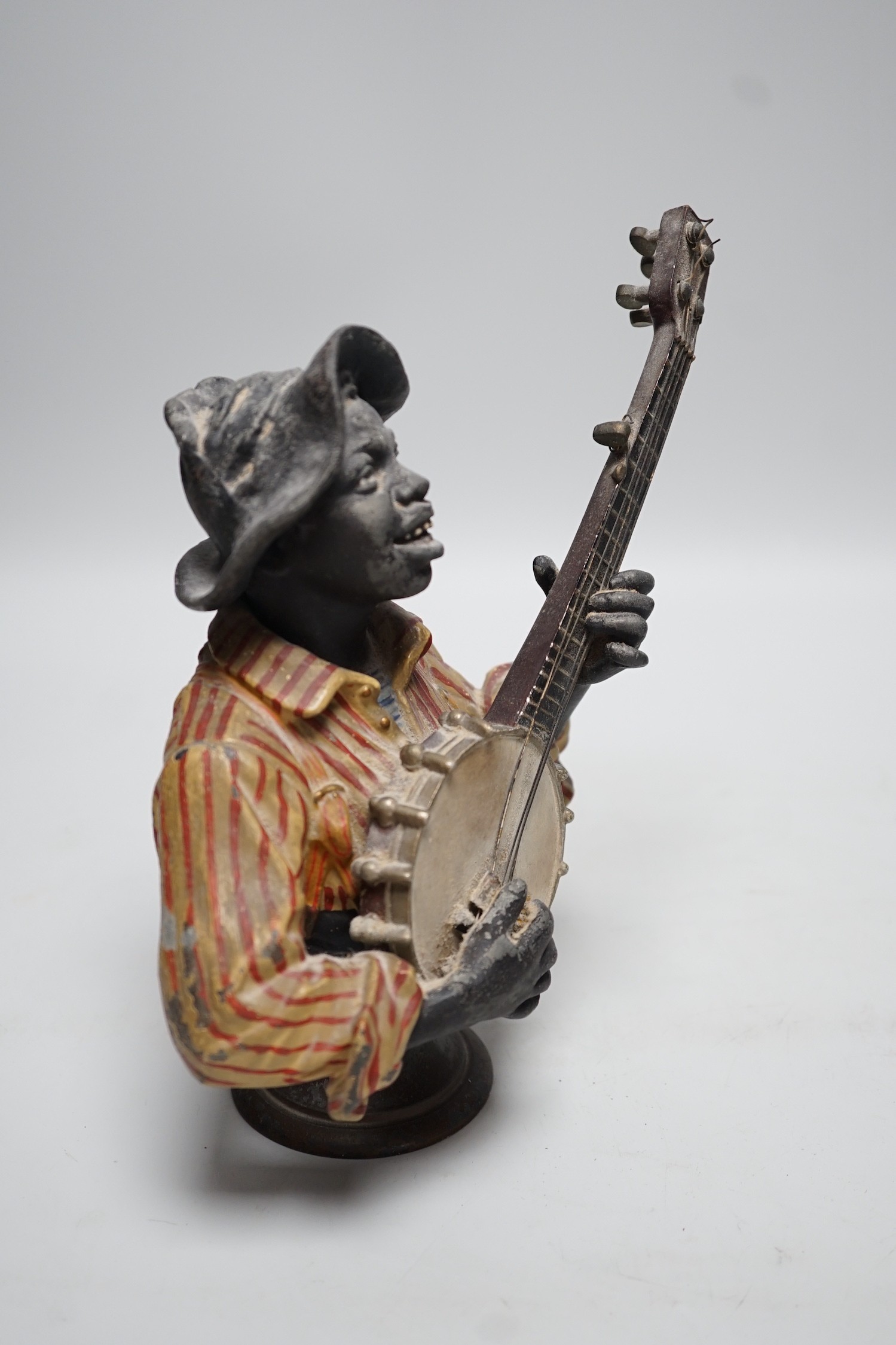 After Emile Coriolan Guillemin (1841-1907). A cold painted spelter model, ‘’The Banjo Player’’, 20cm